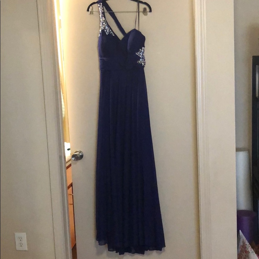 Purple one shoulder gown. Beautiful for prom!
